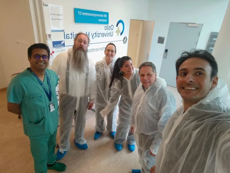 Hospital visit with clinical staff in protective clothing